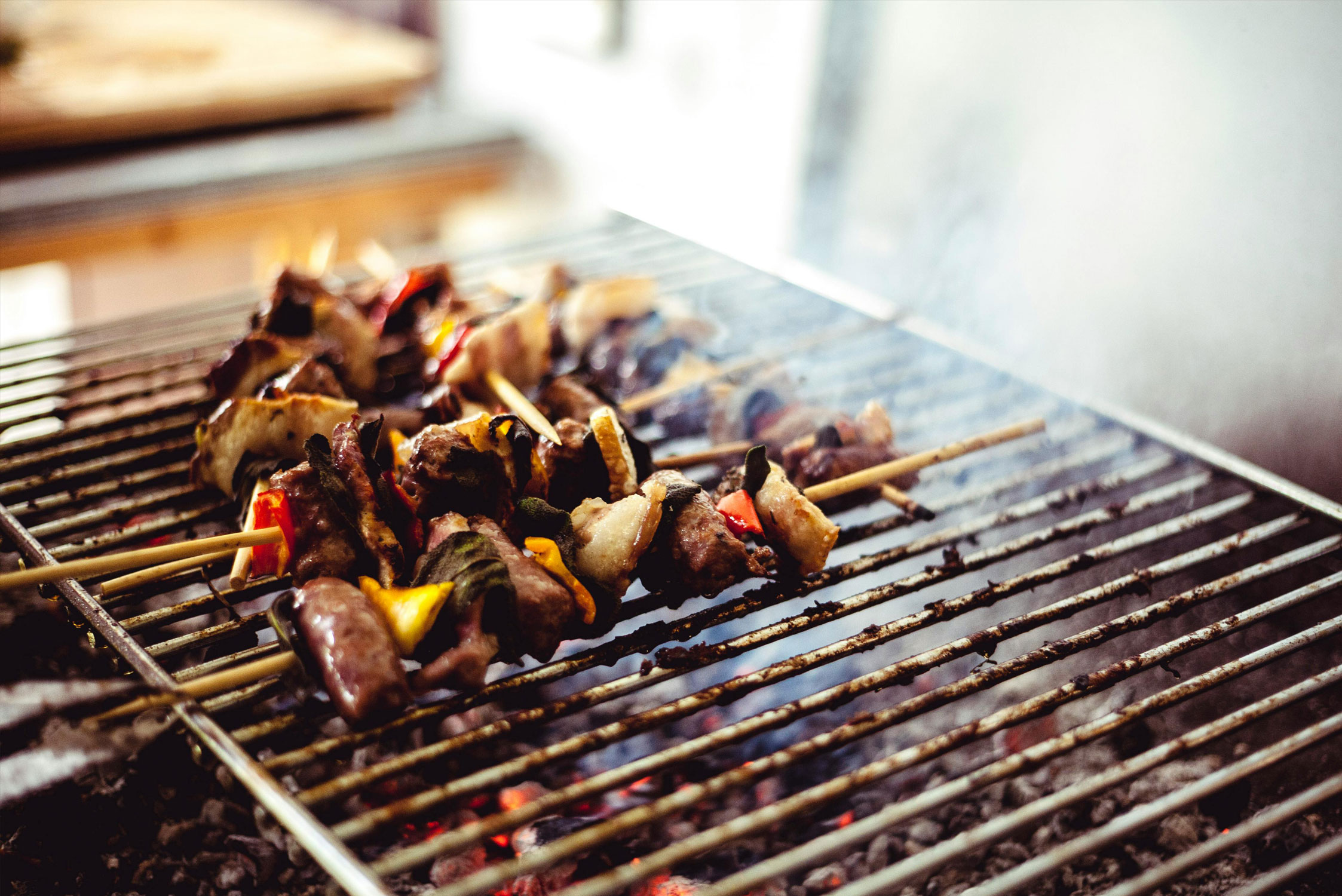 Image of meat grilling.
